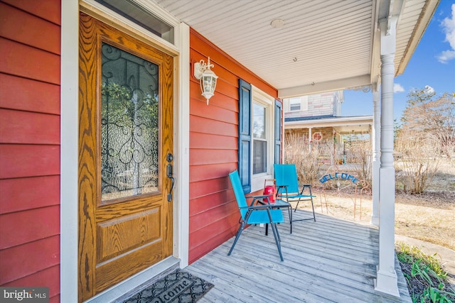 property entrance with a porch