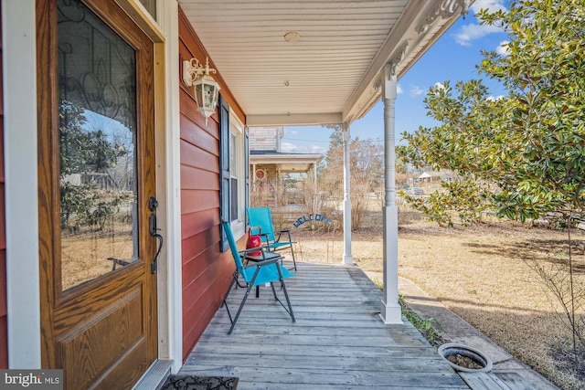 deck with covered porch