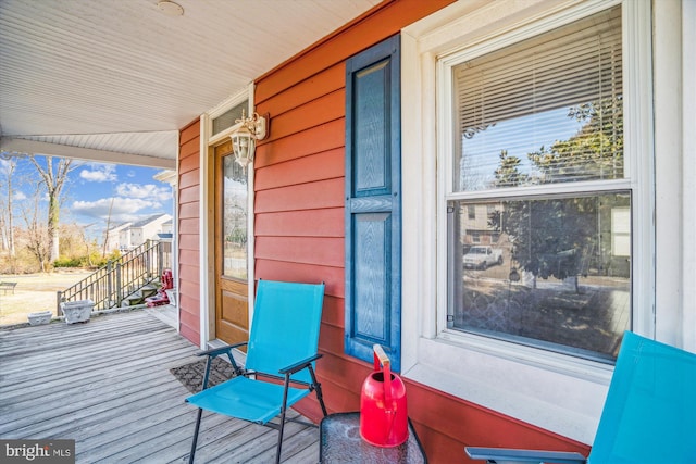 wooden deck featuring a porch