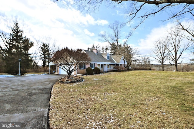 view of front of home with a front lawn