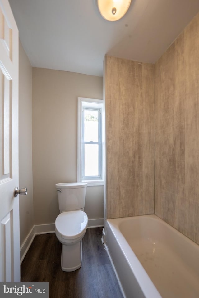 bathroom featuring toilet and hardwood / wood-style floors