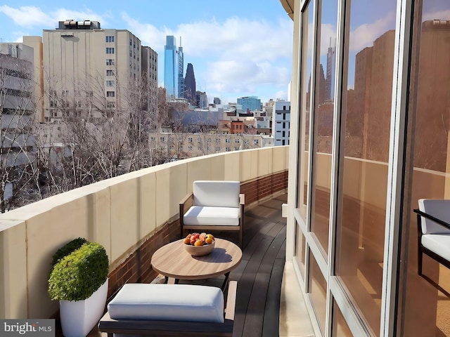 balcony featuring a city view