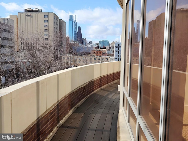 balcony featuring a view of city