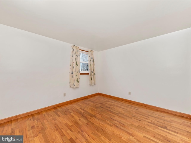 unfurnished room featuring light wood-type flooring