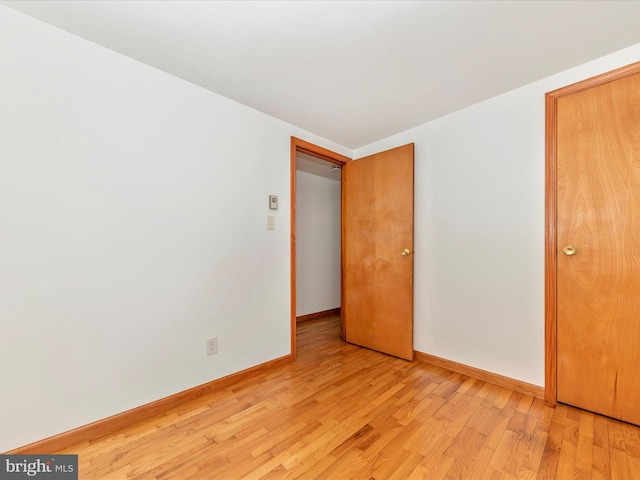 unfurnished bedroom featuring light hardwood / wood-style flooring