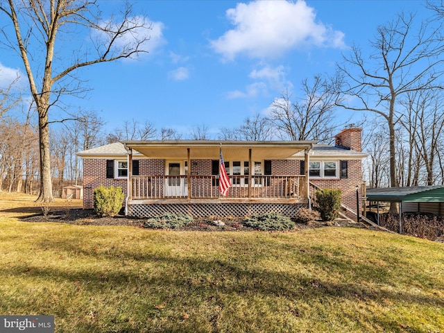 ranch-style house with a carport and a front lawn