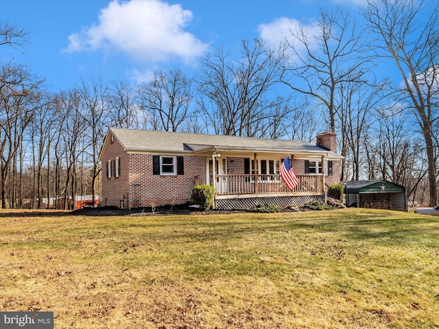 single story home with a porch and a front yard