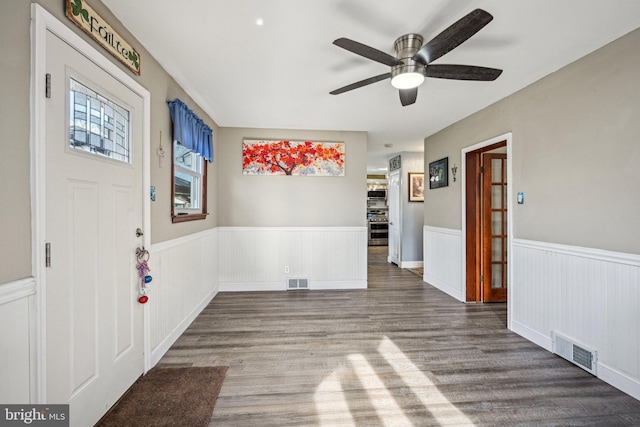 entrance foyer featuring hardwood / wood-style flooring and ceiling fan