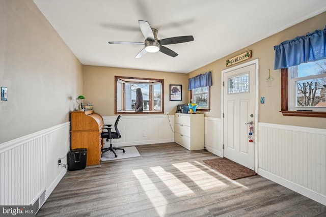 office featuring hardwood / wood-style flooring and ceiling fan