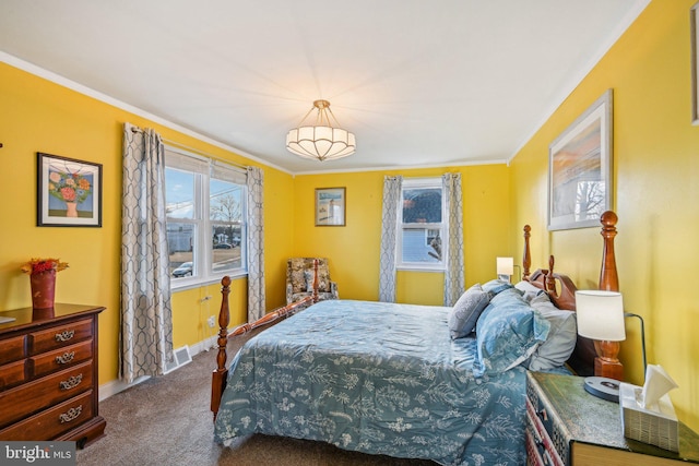 carpeted bedroom featuring ornamental molding