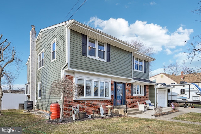 view of front facade with central AC unit and a front lawn