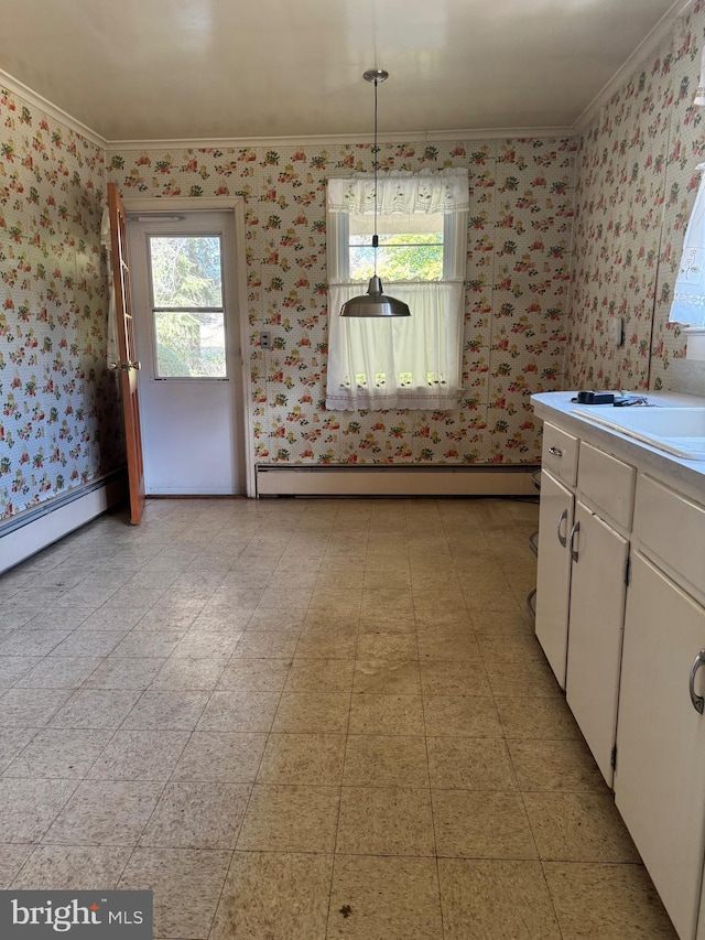 unfurnished dining area with a baseboard radiator and ornamental molding