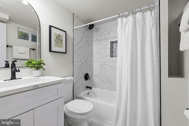 full bathroom with vanity, toilet, and shower / bath combo with shower curtain