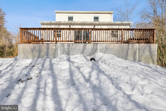 view of snow covered deck