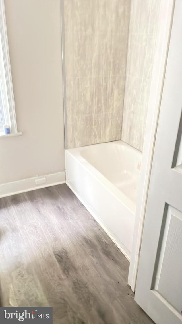 bathroom with wood-type flooring