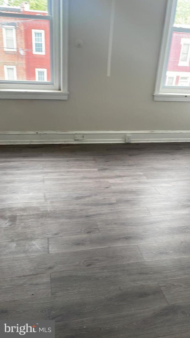 spare room featuring hardwood / wood-style flooring