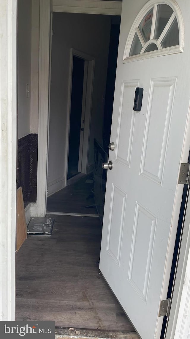 interior space with dark wood-type flooring