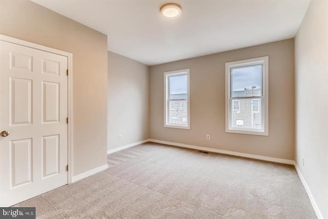 view of carpeted spare room