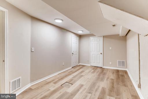 basement with light wood-type flooring