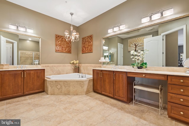 bathroom featuring plus walk in shower, vanity, and an inviting chandelier