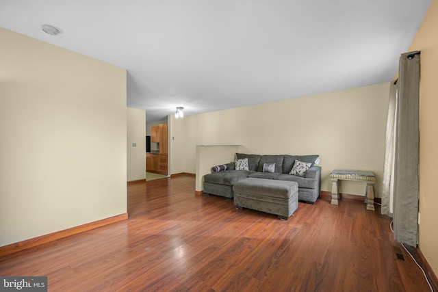 living room featuring dark hardwood / wood-style flooring