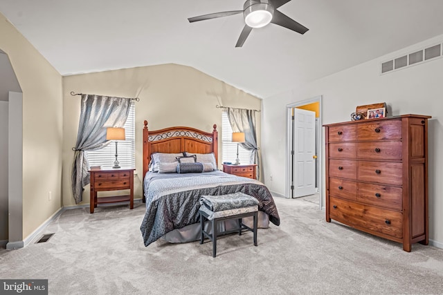 carpeted bedroom featuring lofted ceiling and ceiling fan