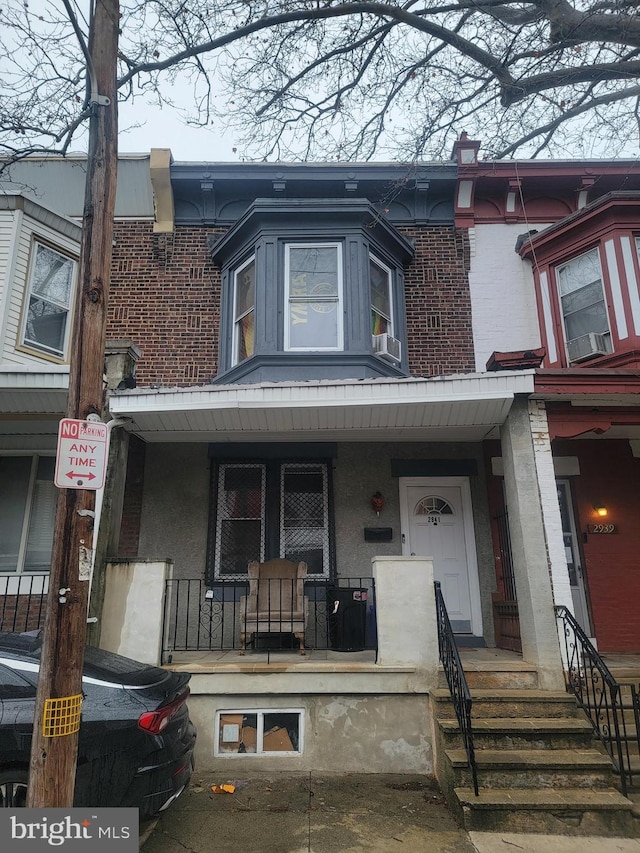 view of property with a porch