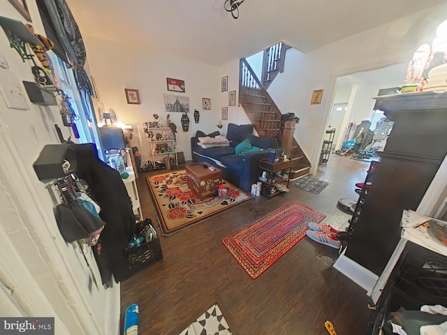 living room featuring dark hardwood / wood-style flooring