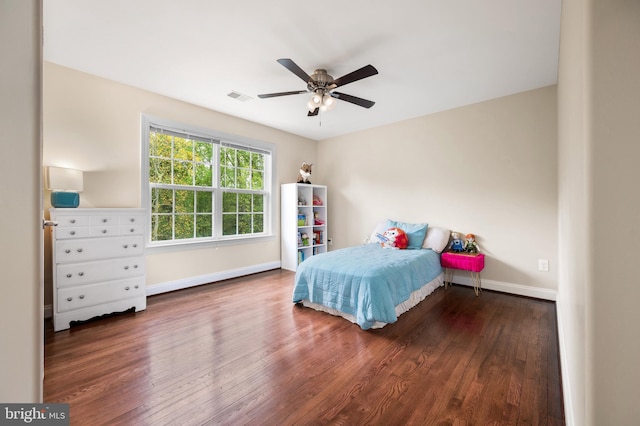 bedroom featuring dark hardwood / wood-style floors and ceiling fan