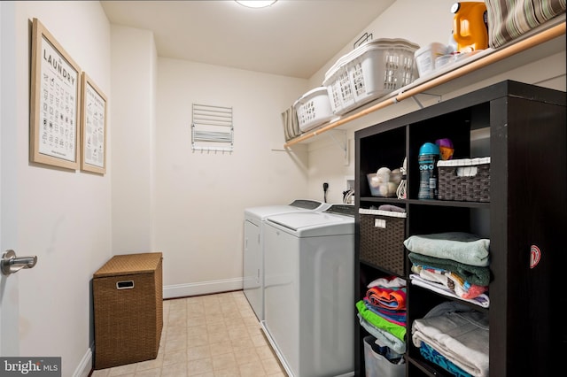 laundry area featuring washing machine and dryer