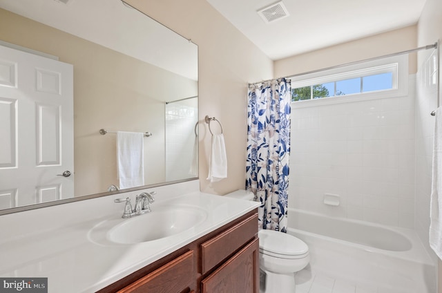 full bathroom featuring vanity, tile patterned flooring, shower / bath combination with curtain, and toilet