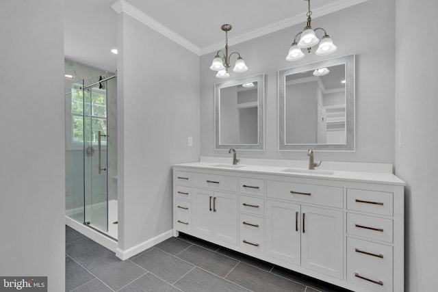 bathroom featuring a shower stall, baseboards, and a sink