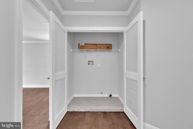 laundry room with laundry area, baseboards, dark wood-style floors, crown molding, and washer hookup