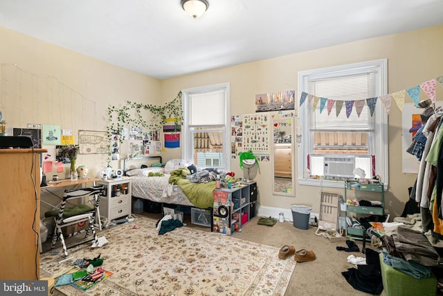 carpeted bedroom with cooling unit