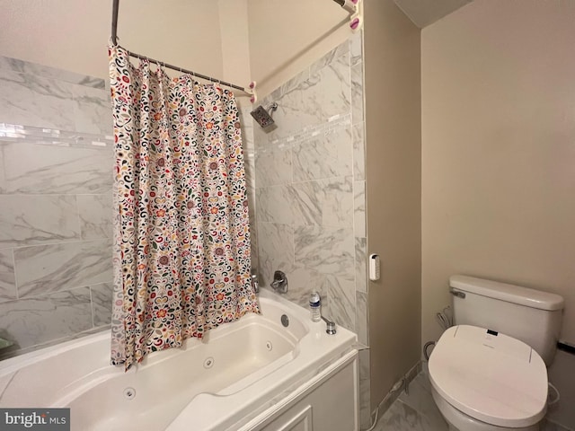 bathroom with shower / tub combo and toilet