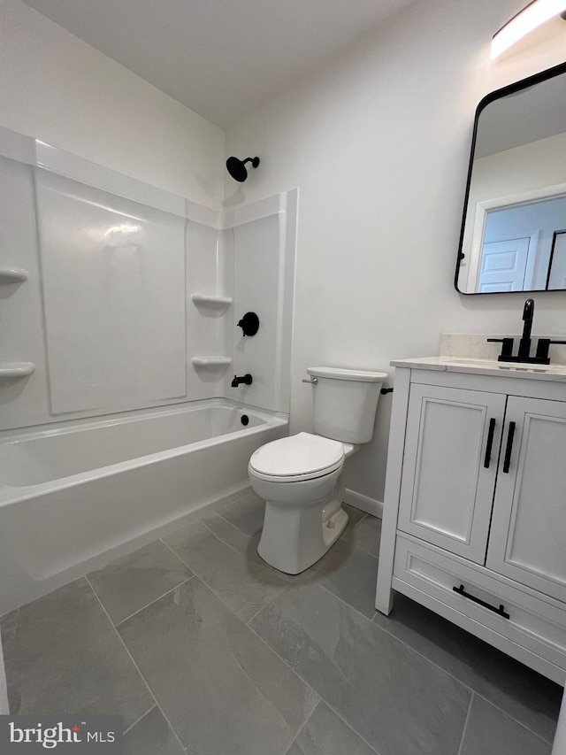 bathroom with  shower combination, baseboards, vanity, and toilet