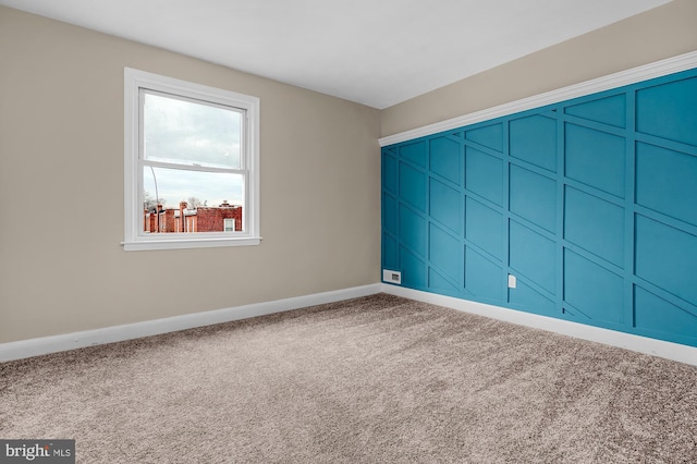 unfurnished room featuring carpet floors