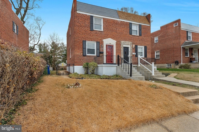 view of front of property with a front lawn