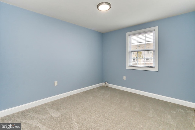 spare room featuring carpet flooring