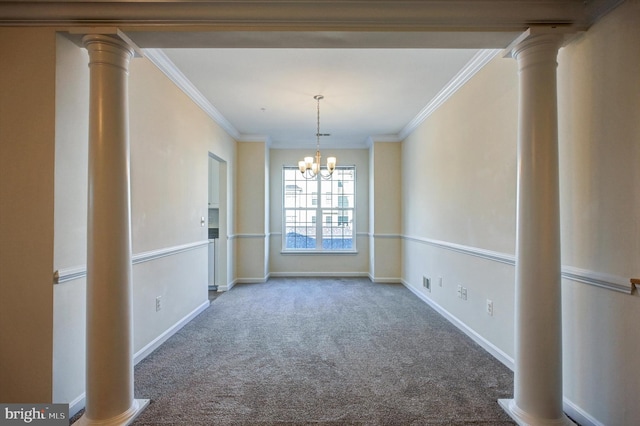 unfurnished dining area featuring decorative columns, ornamental molding, carpet, and an inviting chandelier