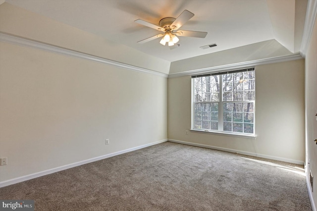 carpeted spare room featuring ceiling fan