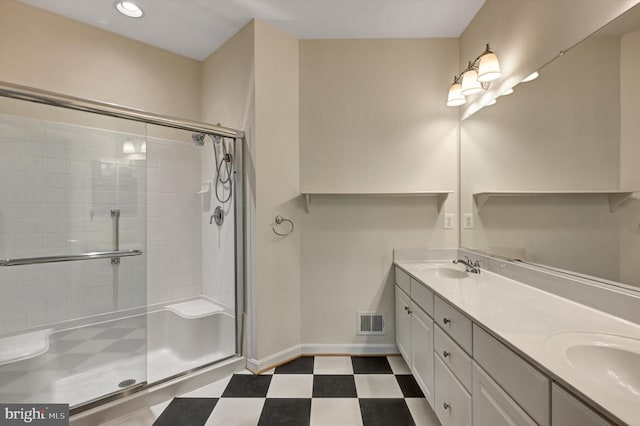 bathroom featuring vanity and walk in shower