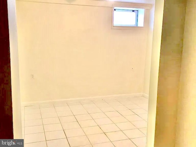 basement with light tile patterned floors