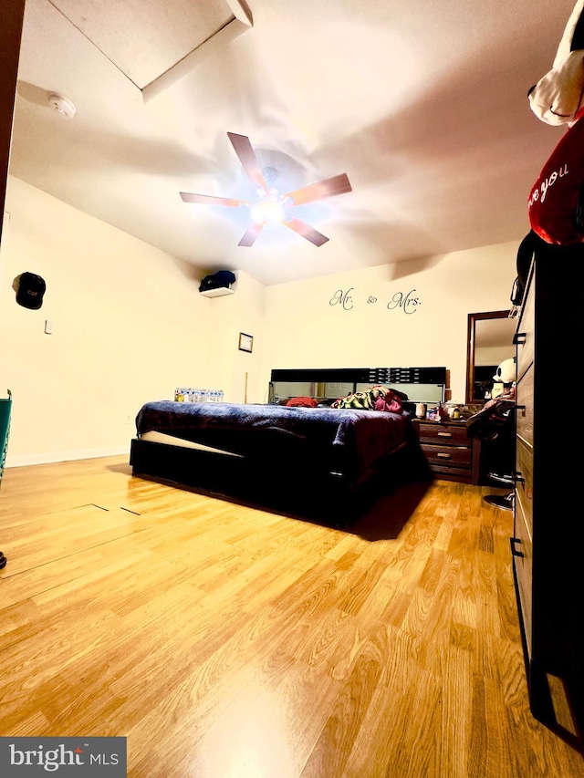 bedroom featuring ceiling fan and light wood-type flooring