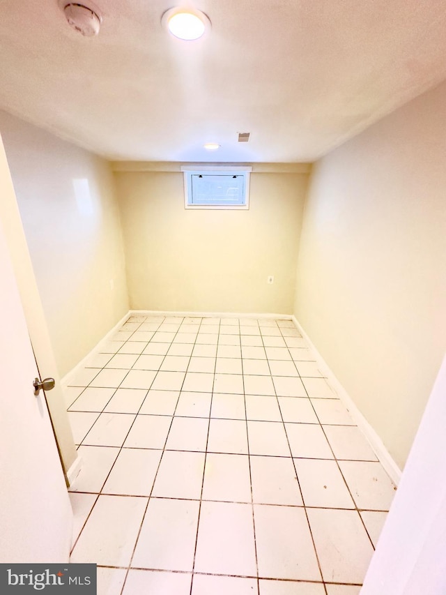 basement with light tile patterned floors