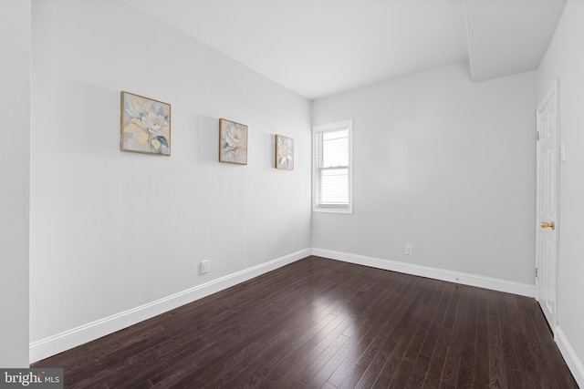 empty room featuring wood-type flooring