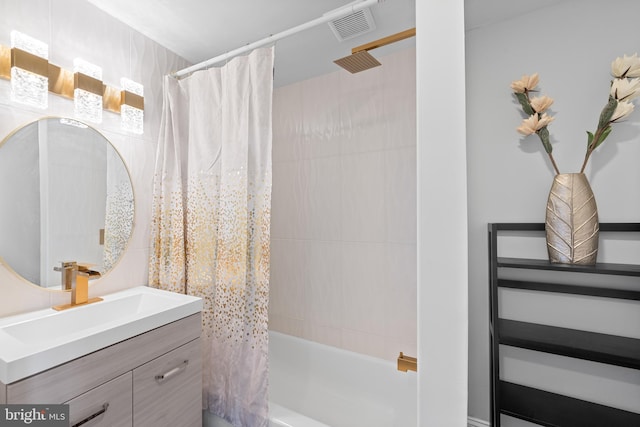 bathroom with vanity and shower / bathtub combination with curtain