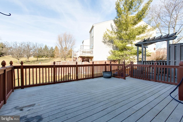 wooden terrace with a pergola