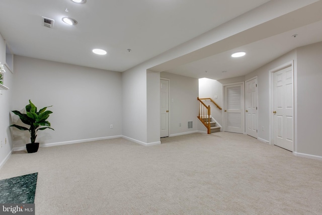 basement with light colored carpet