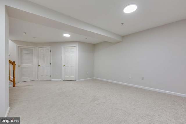 basement with light carpet